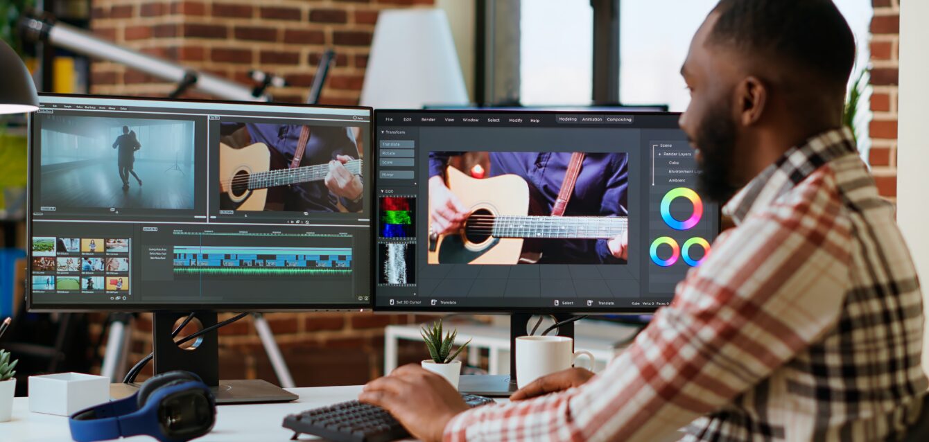 African american freelancer editing a background video at his home office